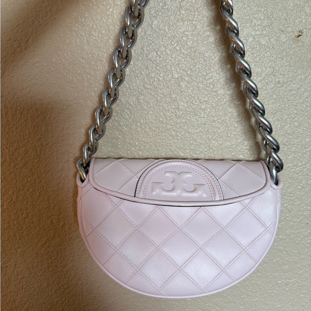 Tory Burch Pink Mini Fleming Crescent Bag.